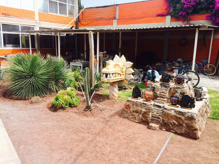 Small garden with hand-made crafts and sculptures