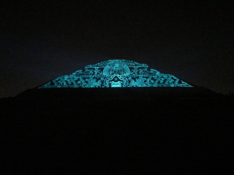 Blue lights light up the pyramids of Teotihuacan