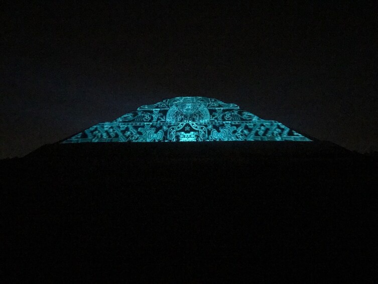 Blue lights light up the pyramids of Teotihuacan