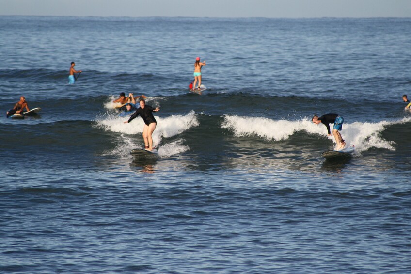 Group surfing in Haleiwa
