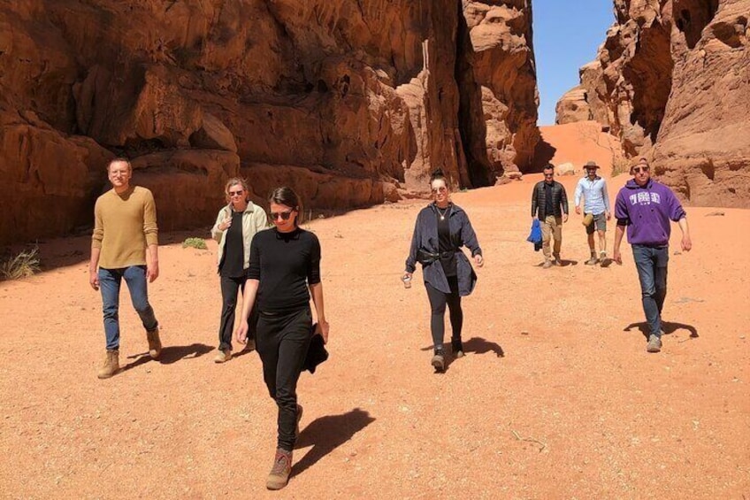 A group of tourists exploring Abu Khashaba Canyon