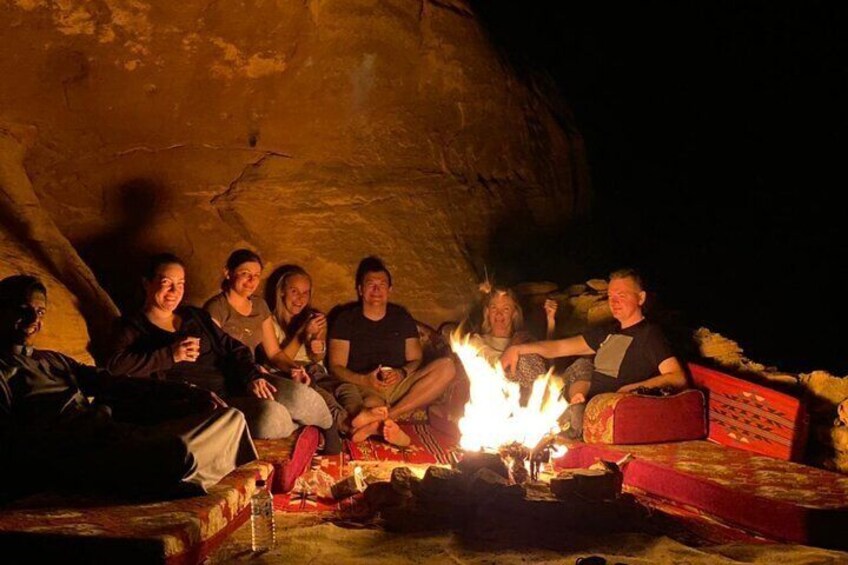 Storytelling around the campfire at the cave