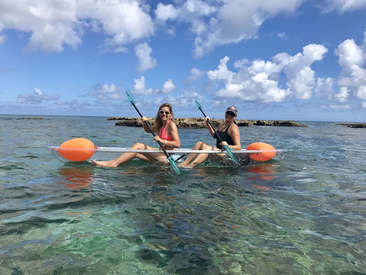 Women on a clear bottom kayaking tour at Haleiwa Beach Park