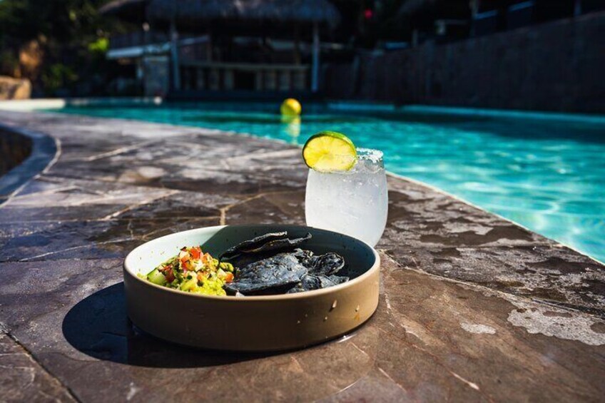 Paradise = Fresh made guacamole blue corn chips and fresh drinks. 