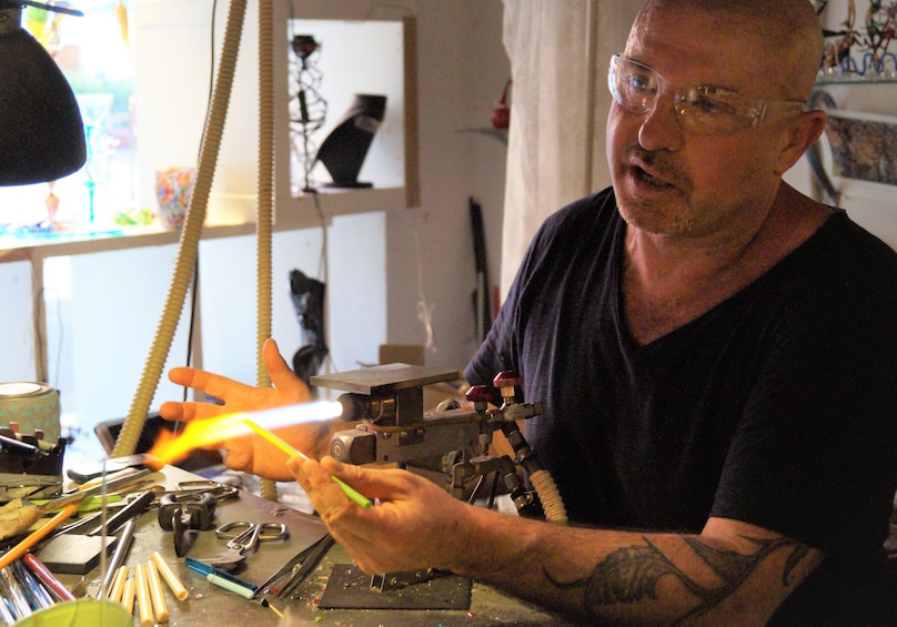 Artist working with glass in Venice