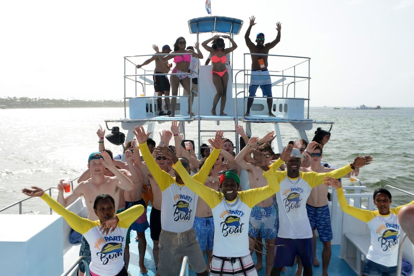 People dancing on a party boat in the Caribbean