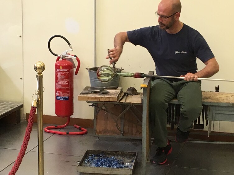 Artist working with glass in Venice