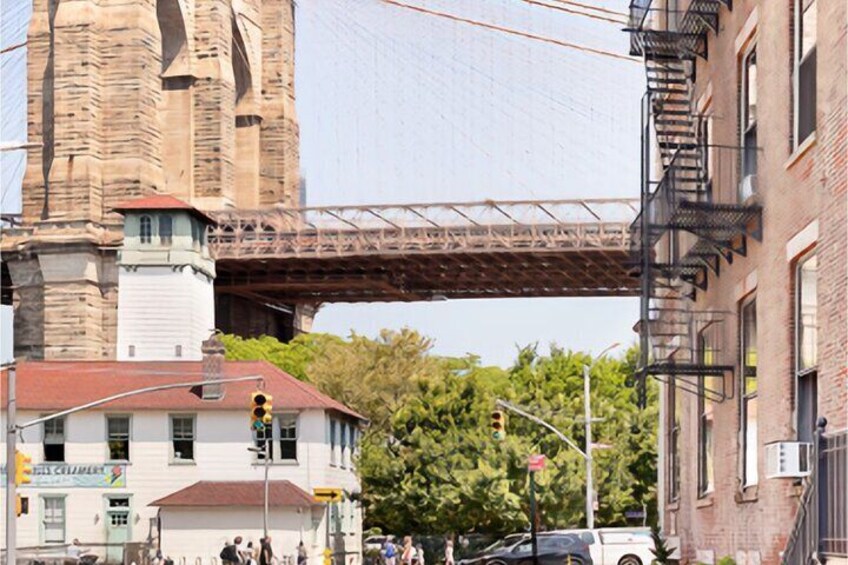 DUMBO is a historic neighborhood that we'll walk through to get on to the Bridge