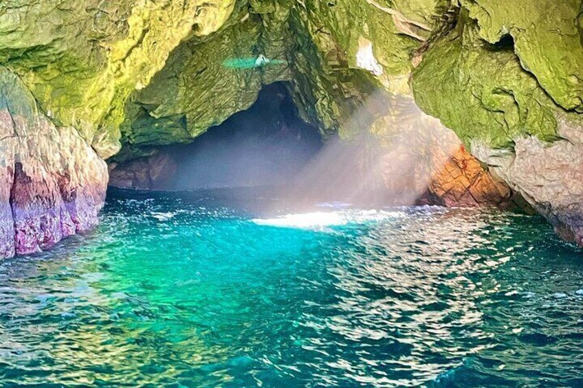 Feel the emotion of the stunning Rainbow Caves at Ile Des Phoques