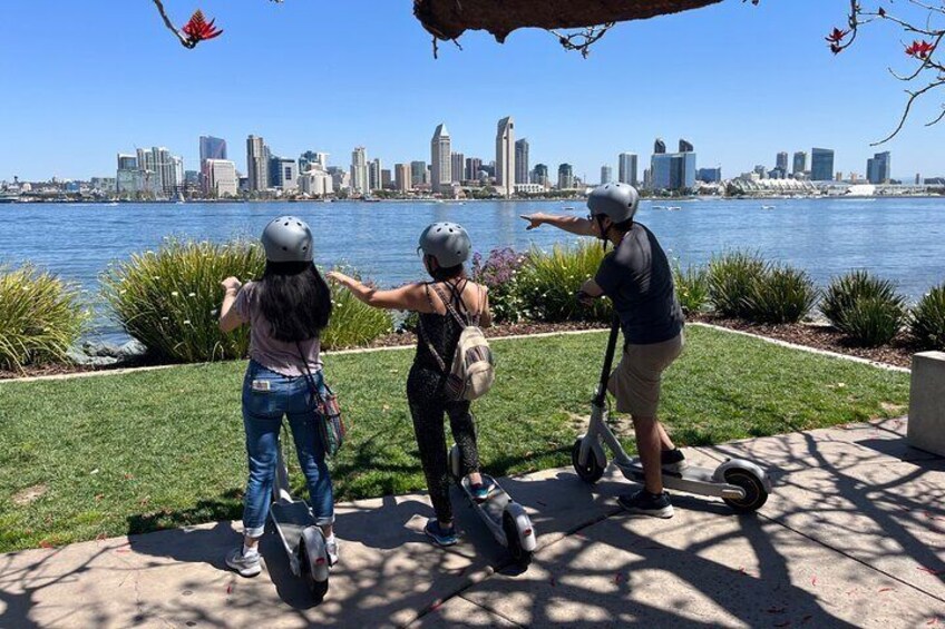 Looking at the downtown San Diego skyline on electric scooters