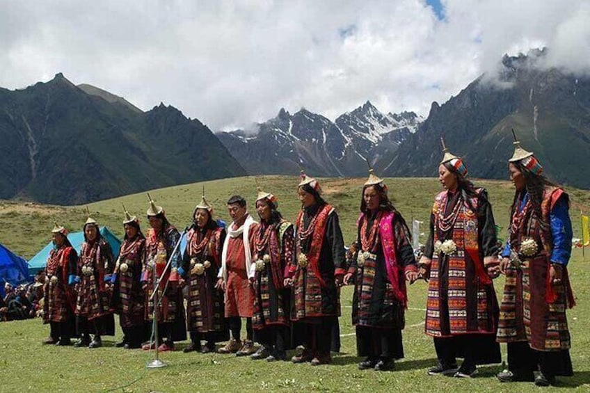 The people of Laya performing traditional dance at local festival