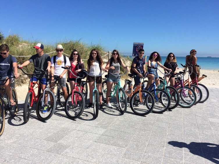 Bicycling group on a beach in Miami