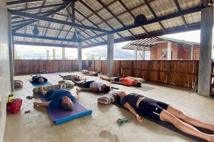 Relax in Savasana. We have all needed equipment