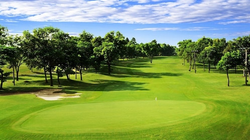 Golf op de green bij de Viet Nam Golf and Country Club