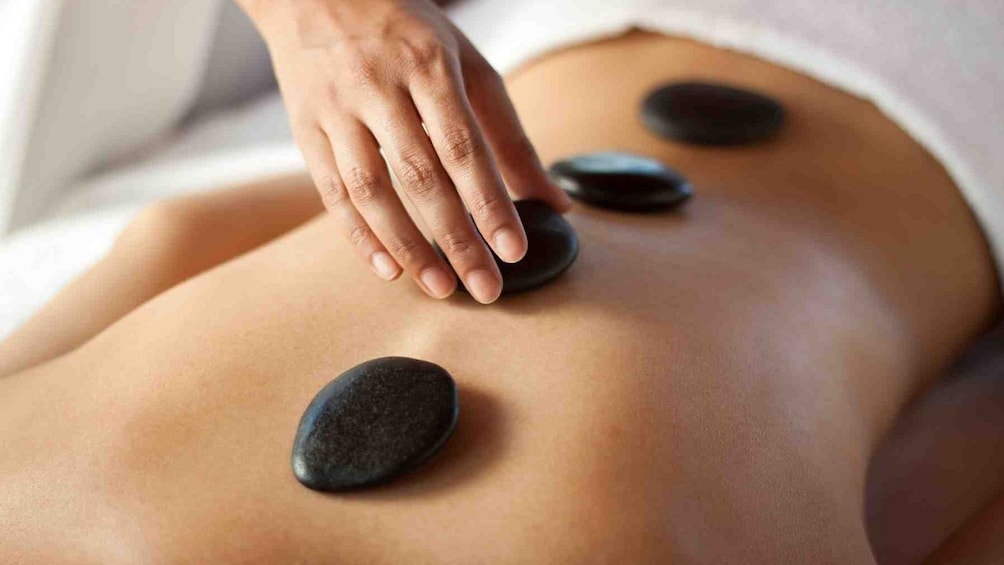 Guests having a hot stone massage in Ho Chi Minh city