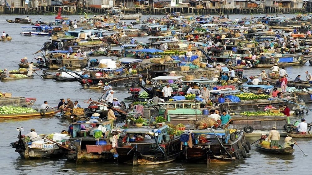 Landscape view of a floating market on the Mekong Delta 