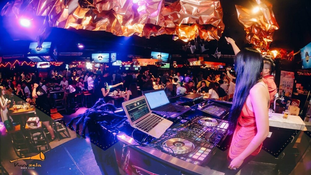 View of a DJ and guests inside a night club in Ho Chi Minh City