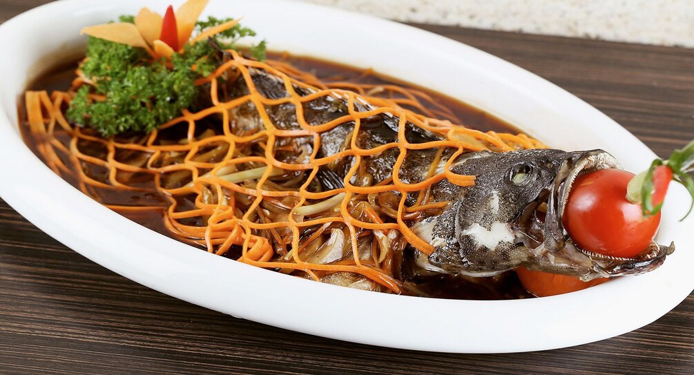 Fish plate for a Vietnamese dinner in Ho Chi Minh City
Source: