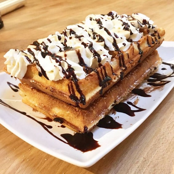 Belgian waffles with chocolate and cream