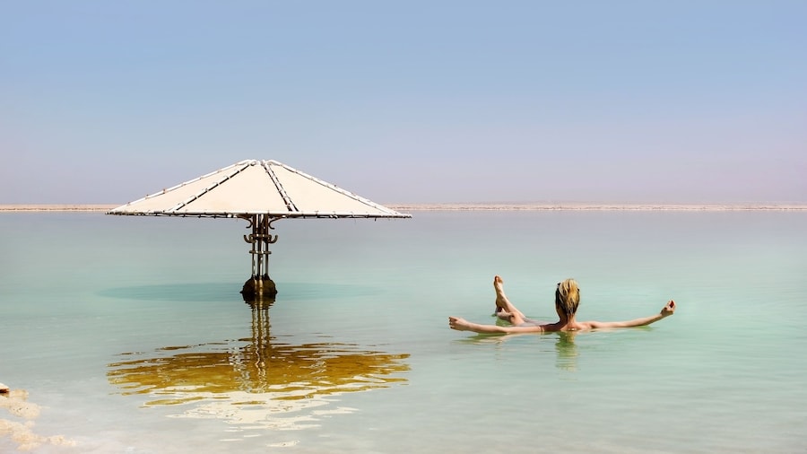 Woman floating in the Dead Sea in Jerusalem