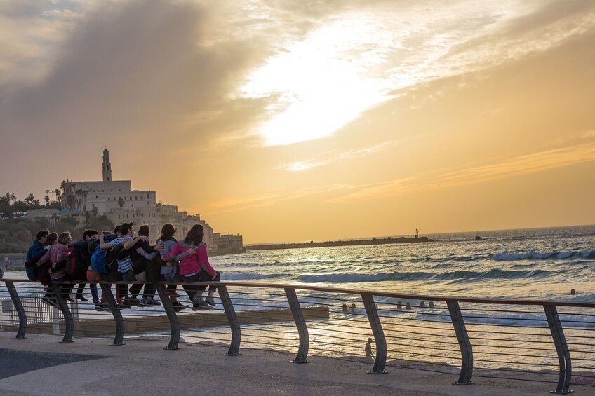 Group looking out at the water from the coast of Tel Aviv