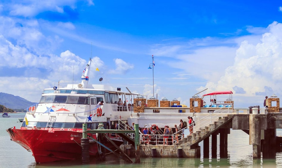 Show item 2 of 7. Ferry docked at Bangrak Pier during the day
