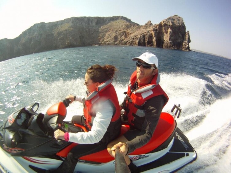 Couple on a Jet Ski Excursion on the Northern Coast of Menorca