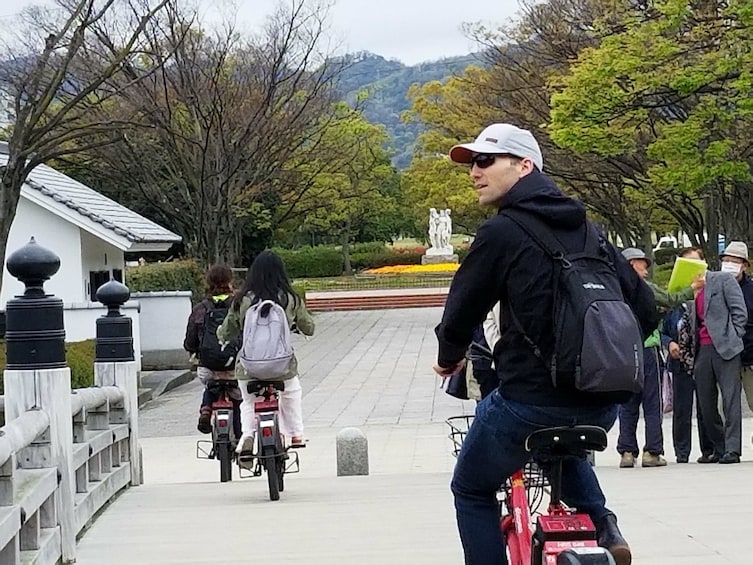 Man riding an electric bike in Hiroshima