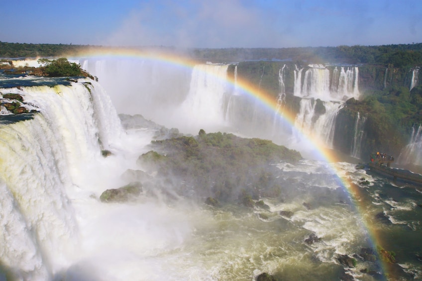 Iguazu Falls with large rainbow in Argentina