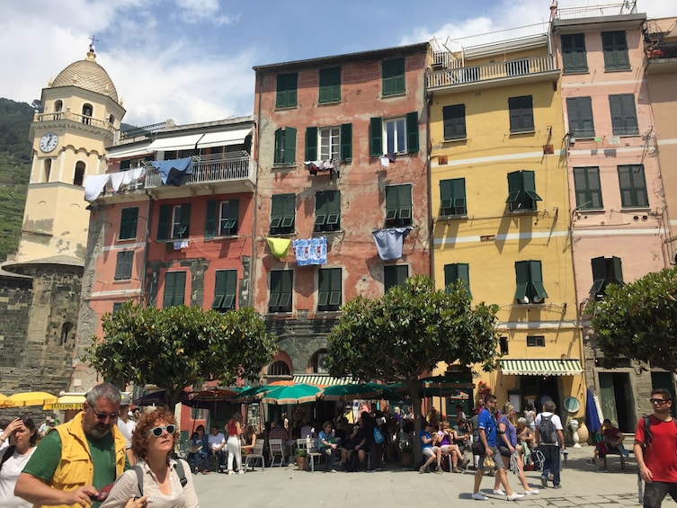 Show item 5 of 9. Tourists walking around Vernazza, Italy