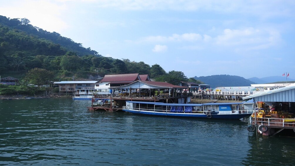 Long boat docked on the Mekong River in Laos