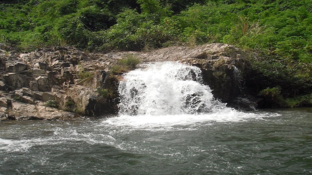 Gushing foamy waterfall in Laos