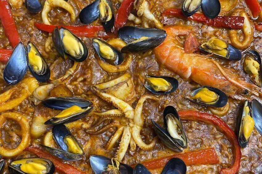 We use the freshest seafood just from Boqueria market for our paella cooking class!