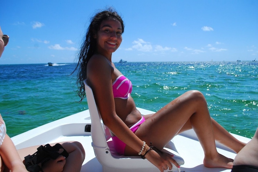 Woman sitting aboard a motorboat in Punta Cana