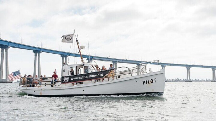 Pilot boat narrated bay tour with Coronado Bridge in the background