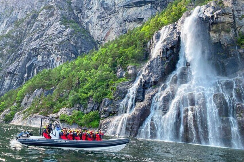The waterfalls in the fjord during summer