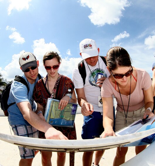 Group on a scavenger hunt-type activity, Amazing Cozumel Race