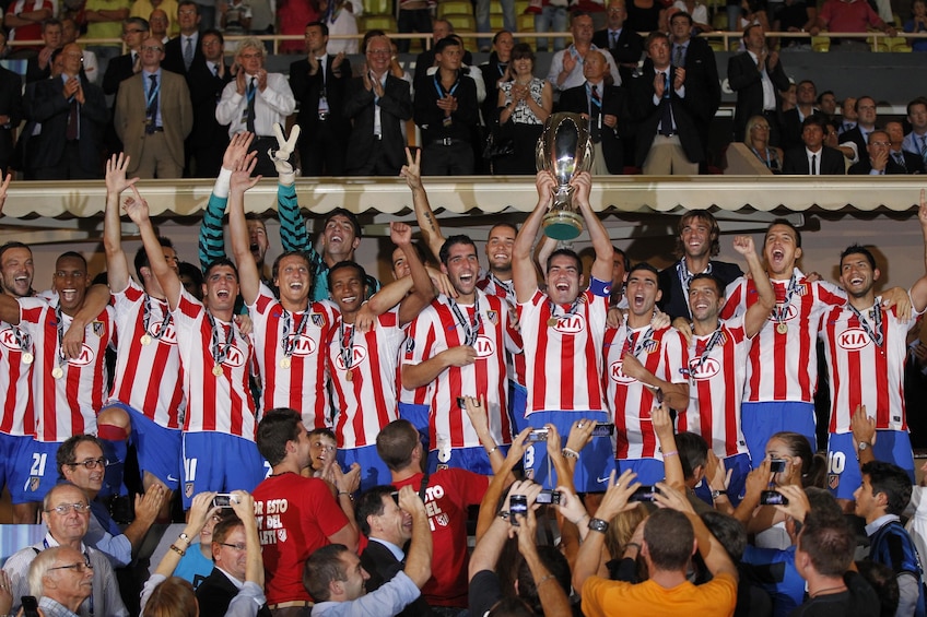 Soccer team with trophy in Barcelona