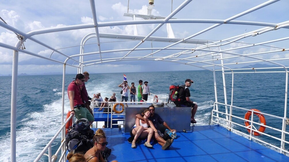 Guests aboard a ferry in Thailand 