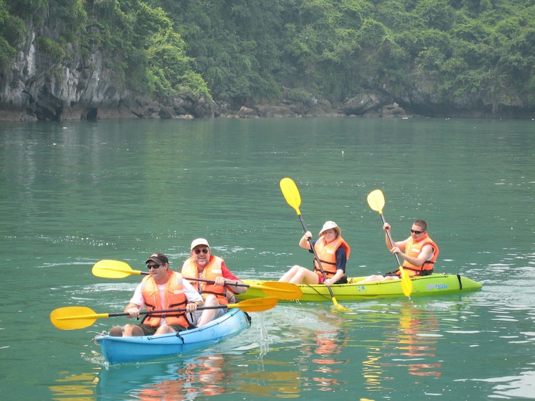 Group kayaking trip along Halong Bay 