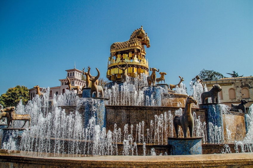 Show item 4 of 4. Fountain with golden horses and other animals in Georgia