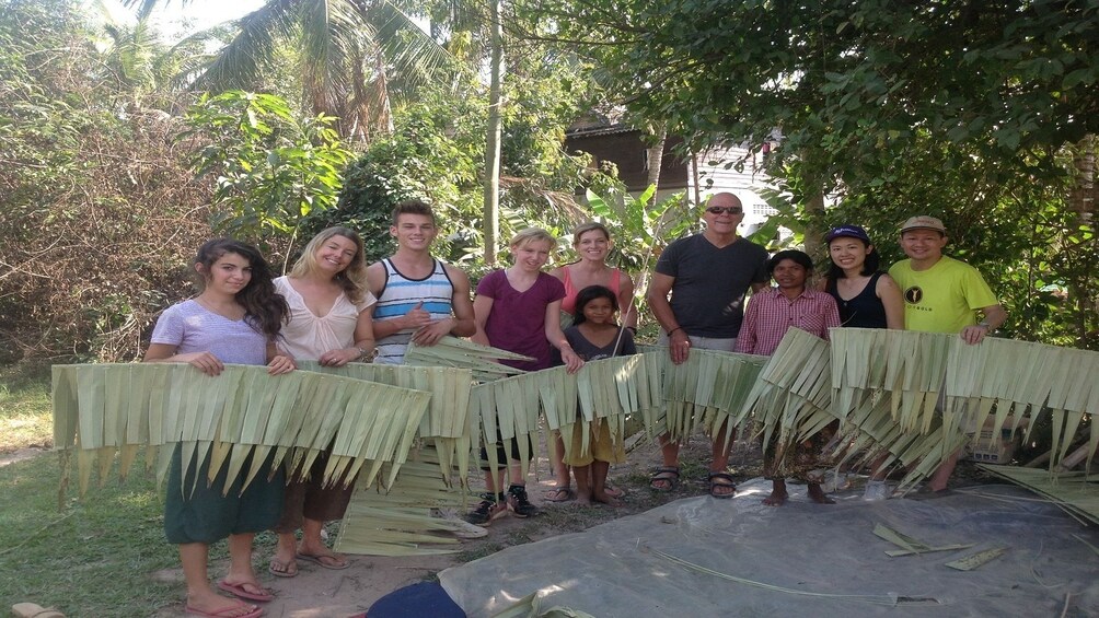 Tour group visiting Kompheim Village