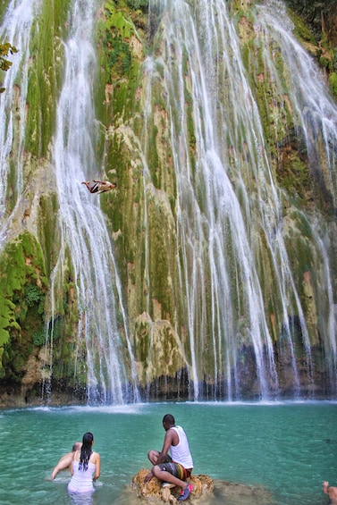 Tourists enjoy El Limon waterfall