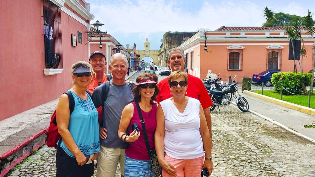 Tourists pose in Colonial City of Antigua, Guatemala
