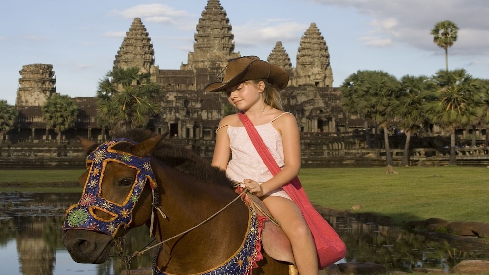 Girl on a horse in Siem Reap