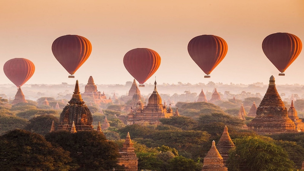 Hot air balloons over pagodas in Bagan