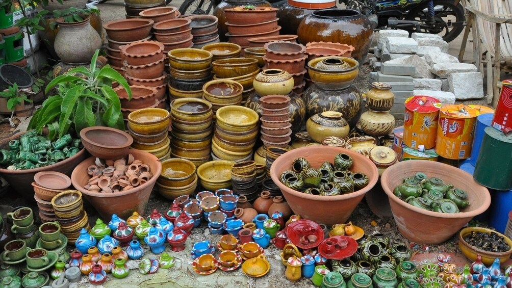 Colorful piles of pottery at Mani Sithu Market in Myanmar