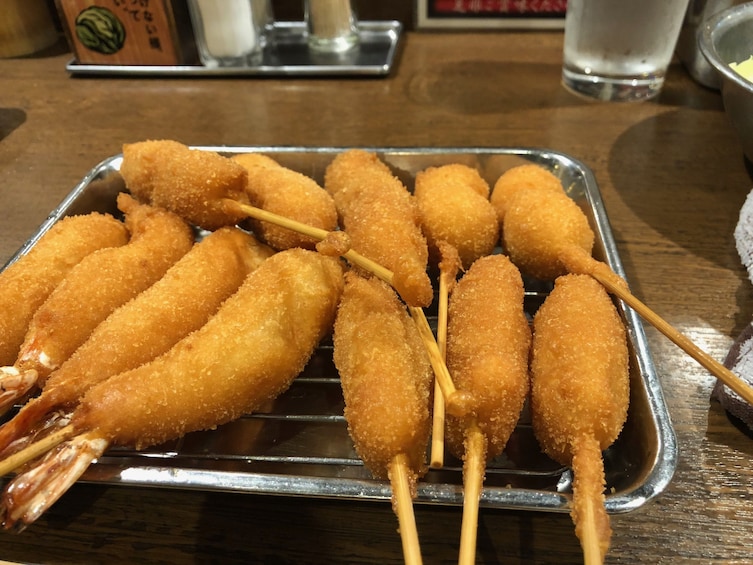 A tray full of corn dogs