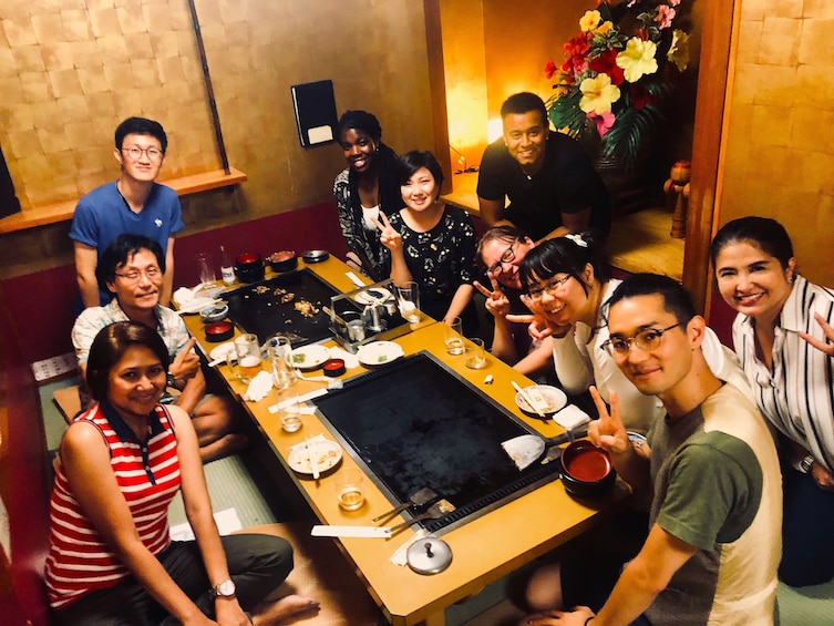 Table full of people at an Osaka restaurant