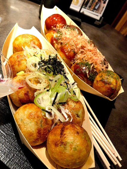 Show item 4 of 10. Street food on an Osaka Food Tour
